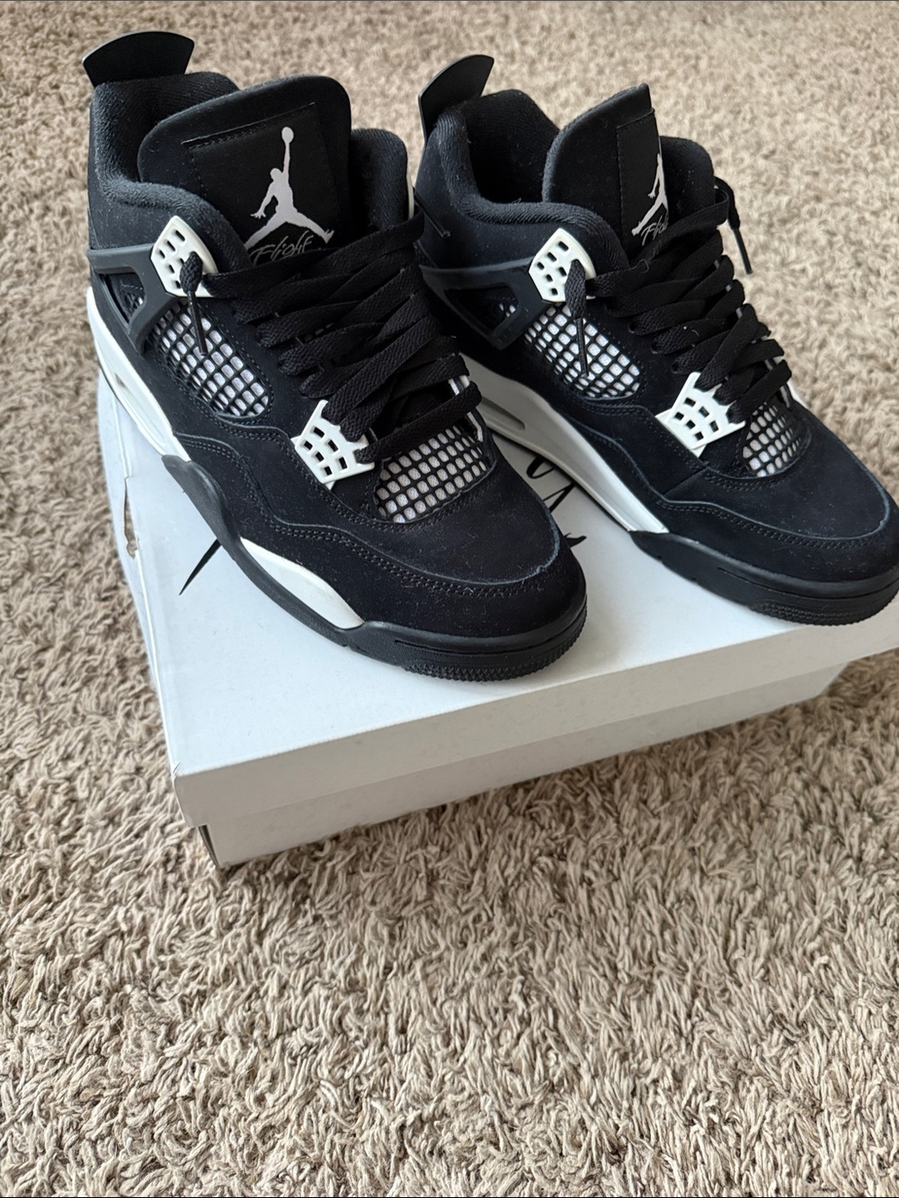 Nike Air Jordan 4 Retro- Black/White Men’s size 7 women’s size 8.5 Sneakers